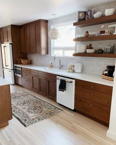 the kitchen is clean and ready for us to use in its new owner's home