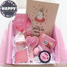 a pink box filled with personal care items