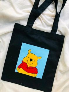 Pooh black tote bag Fabric Bag Design, Birthday Card Drawing, Card Drawing, Tote Bag Patters, Painted Clothes, Insta Posts, Fabric Paint, Black Tote