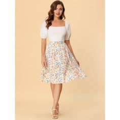 Made of floral-printed fabric, this midi skirt is high-waisted featuring an A-line silhouette. This flowy midi skirt with a tiered design and vintage allover floral prints. Featuring an A-line and tiered details, it is a summer casual skirt to be paired well with a top and sandals for a cute day look and with a stylish T-shirt and vintage high heels for a charming inspired look. Floral Print Midi Skirt For Brunch, Midi Floral Print Skirt For Brunch, Feminine Midi Length Skirt For Garden Party, Flowy Floral Print Maxi Skirt, Floral Print Relaxed Skirt For Brunch, Relaxed Floral Print Skirt For Brunch, Floral Print Flared Skirt For Brunch, Floral Print Relaxed Fit Skirt For Brunch, Floral Print Skirt For Brunch