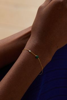 Mateo's timeless pieces are a testament to the beauty of simplicity. This 'Dot' bracelet has been handmade in New York from 14-karat gold and has a slim chain strung with malachite and diamond stones. Stack it alongside your other favorites. 14k Gold Bracelet For Formal Occasions With May Birthstone, Formal 14k Gold Bracelet With May Birthstone, Elegant Green Diamond Bracelet In 14k Gold, Elegant Green Gemstone Gold Bracelet, Elegant Adjustable Green Gold Bracelet, Elegant Emerald Jubilee Bracelet, Elegant Green Gold Jubilee Bracelet, Classic Green Bracelets For May Birthstone, Elegant Green Round Chain Bracelet