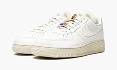 The Women’s Nike Air Force 1 Low Premium “Bling - Summit White” is a women’s-exclusive colorway of the vintage basketball shoe that features jewelry for an elevated design. Reminiscent of the Air Force 1 Low “Bling” from Summer 2020, the “Summit White” incorporates three pieces of “bling” for a luxurious appearance. The upper displays a white leather construction with a more textured tonal tumbled leather Swoosh and heel tab with “Nike Air” embroidery. The beige nylon tongue features grey “Nike Womens Nike Air Force 1, Vintage Basketball, Casual Sneakers Women, Nike Air Force 1 Low, Air Force Ones, Grey Nikes, Air Force 1 Low, Sneaker Collection, Sportswear Women