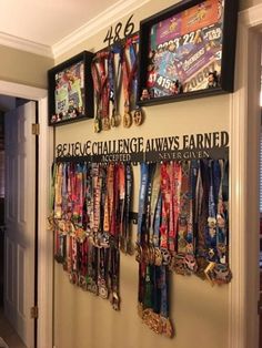 a wall with medals hanging from it's sides