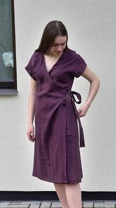 Wrapped women dress. Elegant V-shaped neckline. Side seam pockets. Wide skirt. Model wears size S and she is 172cm/ 5'7" tall. 100% Lithuanian linen, one of the finest in Europe. SIZE GUIDE Body measurements: in cm / inch: Size XS EUR34  Bust - fits bust around 80-84cm (31-33") Waist - fits waist around 62-65cm (24-25") Hips - fits hips around 90-93cm (35-36.50") Size S EUR 36  Bust - fits bust around 86-90cm (34-35") Waist - fits waist around 66-70cm (26-27") Hips - fits hips around 94-98cm (37 Linen Clothes Dress Manniquin, Women's V Neck Dress, Casual Dresses Wrap, Plain Wrap Dress, Purple Wrap Dress, Pink Linen Dress, Dresses Handmade, Natural Linen Dress, Linen Wrap Dress