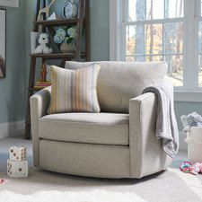 a living room filled with furniture and decor