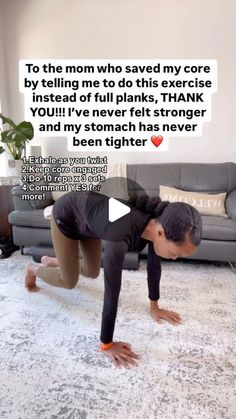 a man is doing a handstand on the floor in front of a couch