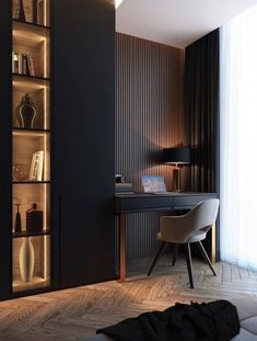 a room with a desk, chair and bookshelf on the wall next to it