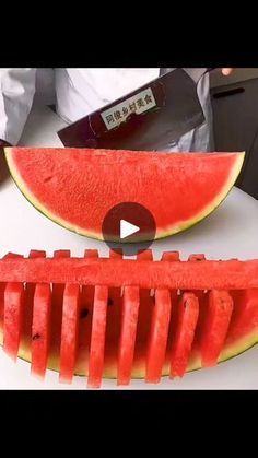 a slice of watermelon is cut in half