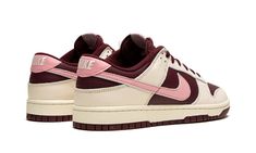 The Nike Dunk Low Premium “Valentine’s Day 2023” is a festive colorway of the retro basketball shoe that celebrates the Lover’s Holiday.  The “Valentine’s Day” Dunk Low is the 2023 version of the popular theme that shows love, no pun intended, to Valentine’s Day.  This time around, the shoe features a two-tone, maroon and Pale Ivory color combination.  Specifically, maroon leather appears on the base while Pale Ivory leather overlays.  A pink tumbled leather Swoosh is found on either side of the Valentine’s Day Dunks, 2023 Shoes, Sneaker Displays, Kobe Shoes, Retro Basketball Shoes, Retro Basketball, Womens Basketball Shoes, Kicks Shoes, Maroon Leather