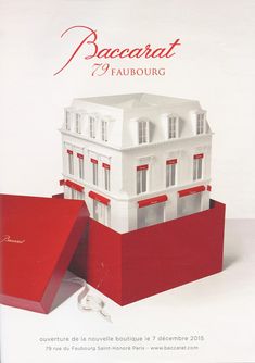 a red box with a white house in it and the words baccbatt faubourg