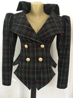 This is a very stylish and elegant jacket . Leght  58cm - at back. Fully lined. A jacket especially made to turn heads and give you that wow factor :) Vintage style leg o mutton sleeves.SIZE CHARTSIZE S - US 6, UK 8, EU 36bust: bust around 34.5”/90cmWaist: waist around 27.5”/70cmHips: hips around 34.5”/90cmSIZE M - US 8, UK 10, EU 38bust: bust around 37.5”/95cmWaist: waist around 29.5”/75cmHips: hips around 37.5”/95cmSIZE L - US 10, UK 12, EU 40bust: bust around 39.5"/100cmWaist: waist around 31 Tailored Plaid Long Sleeve Blazer, Tailored Plaid Blazer With Long Sleeves, Plaid Blazer With Buttons For Tailoring, Plaid Long Sleeve Office Blazer, Plaid Blazer With Buttons, Plaid Blazer With Buttons For Office, Winter Plaid Blazer With Buttons, Plaid Office Blazer With Buttons, Fitted Plaid Double-breasted Blazer