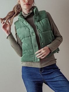 "Introducing our Retro Chic Corduroy Puffer Vest--a stylish embodiment of vintage vibes and modern comfort. This vest seamlessly marries the classic charm of corduroy with the cozy warmth of a puffer design, making it a versatile and trendy addition to your wardrobe. Crafted with care, this puffer vest features a high collar that adds a touch of sophistication while keeping you warm. The snap button and zipper closure offer flexible styling options and easy wear, making it a breeze to layer up f Corduroy Puffer Vest, Corduroy Puffer, Corduroy Vest, Virgo And Aquarius, Cozy Tops, Winter Boho, Winter Clothes, Retro Chic, Cozy Fashion