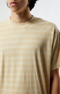 Step into casual vibes with the PacSun Even Textured Stripe T-Shirt. This tee boasts a classic crew neckline, short sleeves, and a standard fit for timeless appeal. The subtle stripes and soft knit fabrication add a touch of sophistication, making it a versatile choice for effortlessly refined and comfortable everyday wear.


	Crew neckline
	Short sleeves
	Standard fit
	Stripes
	60% Cotton, 40% polyester
	Machine washable
	Model is wearing size medium
	Model Measurements: 6'3” Height, 32” Waist, 34” Inseam Stripe T Shirt, Soft Knits, Model Measurements, Pacsun, Mens Tees, Crew Neckline, Everyday Wear, Short Sleeves, Stripes