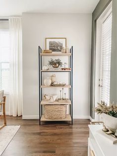 a living room filled with furniture and decor