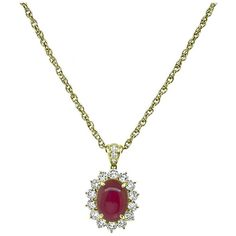 This is a charming 18k yellow gold pendant necklace. The pendant is centered with a lovely cabochon Burma ruby that weighs approximately 5.06ct. The ruby is accentuated by sparkling round cut diamonds that weigh approximately 1.40ct. The color of the diamonds is G with VS clarity. The pendant measures 24mm by 15mm. The chain measures 16 inches in length. The necklace is stamped K18 5.06 1.40 and weighs 7.6 grams. Diamond Gold Pendant, Diamond Gold, Yellow Gold Pendants, Gold Pendant Necklace, Round Cut Diamond, Favorite Things Gift, Gold Pendant, Pendant Necklaces, Round Cut