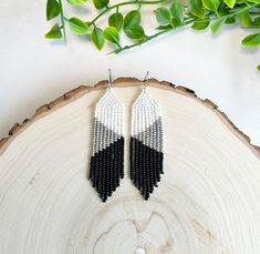 Beautiful mid-length fringe earrings in White, Black and Silver with a triangle pattern. Great for everyday wear or a night out! They are very lightweight and flowy.  These make a great gift for any occasion! Graduation, birthday, Christmas, etc. * DETAILS *   - Made with sturdy nylon thread   - White, Gold and Silver Czech glass seed beads   - .925 Sterling Silver earring hook * Size *  - Length: 3.25 inches (including the hook)  - Width: 0.75 inches **If you would like a size that is longer, p Black And White Beaded Earrings, White Beaded Earrings, Earring Hook, Earrings Geometric, Triangle Pattern, Glass Gifts, Earrings Long, Seed Bead Earrings, Fringe Earrings