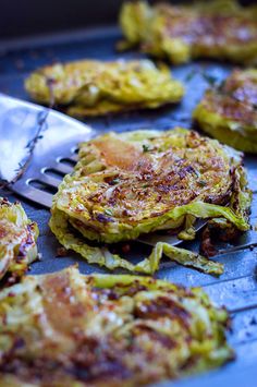 some food that is sitting on a table with a spatula in front of it