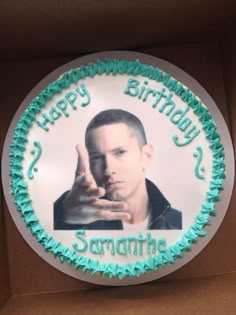 a birthday cake with the image of a man pointing his finger at someone's hand