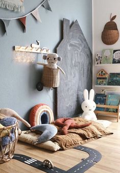 a child's bedroom decorated in blue and brown