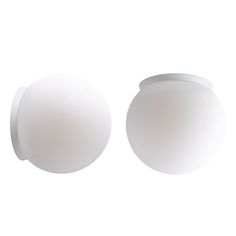 two white round lights on a white background