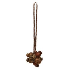 a brown rope hanging from the ceiling with an animal on it's back end