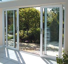 an open patio with sliding glass doors leading outside