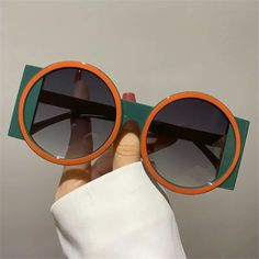 Department Name : ADULT Gender : WOMEN Frame Material : Polycarbonate Lenses Optical Attribute : UV400 Brand Name : gootrades Style : Rectangle Product Name: Oversized Round SunglassesStyle: Y2K Style, TrendyColor: Red,Orange,Blue,Green,Gray,ChampagneLens Material: PolycarbonateFrame Material: PC,Polarization Type: Non-PolarizedProduct Size:Total Width: 147mm (5.79inch)Frame Width: 65mm (2.56inch)Frame Height: 65mm (2.56inch)Nose Bridge Width: 20mm (0.79inch)Temples Length: 143mm (5.63inch)Weigh Colour Blocking Fashion, Oversized Round Sunglasses, Round Sunglasses Women, Party Sunglasses, Look Retro, نظارات شمسية, Beach Sunglasses, Pink Frames, Retro Pop