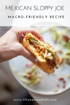 a person holding a sandwich in their hand with the text mexican sloppy joe macro - friendly recipe