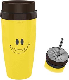 a yellow coffee cup with a smiley face drawn on it and a straw in the lid