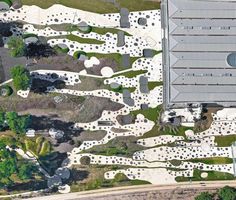 an aerial view of a skate park with ramps