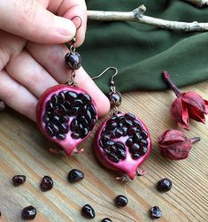 "Garnet Pomegranate Earrings Chunky Fruit earrings Round Dark Red earrings Luxury Garnet jewelry Long evening earrings Festive trendy jewelry Original chunky Luxury earrings with natural garnet (inside pomegranate and beads in top) Diameter of pomegranate 3,5cm (1.18\") full length 7cm (2.7\") Please attention! This earrings not very lightweight because with a lot of natural gemstones! For lovers of chunky earrings! all items from my garnet pomegranate collection garnet pomegranate ring https:// Handmade Burgundy Earrings For Gift, Garnet Pomegranate, Dark Red Earrings, Pomegranate Necklace, Pomegranate Earrings, Evening Earrings, Earrings Luxury, Chunky Earrings, Fruit Earrings