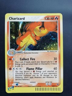 a card with the name charizard on it, in front of a black background