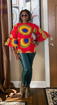 "Beautiful African top made from African Ankara wax prints with peplum sleeves! This fun peplum top comes with a back zipper and can be worn to parties, office, or date nights. Our items are handcrafted with love upon purchase so it is helpful to include your measurements at checkout. You're sure to love this new POPPY Tops Select from different colors- see all pictures... To purchase, select color, select size, place item in the cart, and checkout. We will make the item with the measurements li Orange Tops, African Tops For Women, Ankara Blouse, African Blouses, African Tops, Orange Top, African Wax Print, Wax Print, Ankara