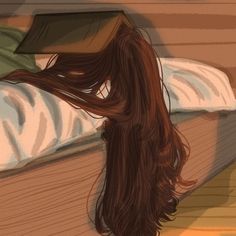 a woman with long brown hair laying in bed