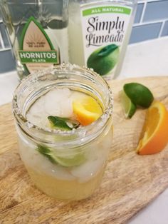 a close up of a drink on a cutting board