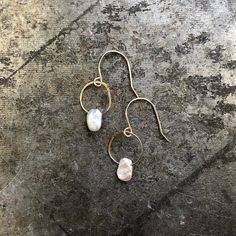 These birthstone earrings are simple, special and sweet. Pearls dangle from a lightly hammered jump ring on handmade earring wires. Pearl is the birthstone for June and symbolizes love, stability and confidence. Length 1/2" Width 1/4" Dainty Hammered Jewelry For Anniversary, Delicate Hammered Jewelry For Anniversary, Everyday Brass Jewelry With Birthstone, Dainty Hammered Jewelry For Everyday, Delicate Hammered Sterling Silver Jewelry, Everyday Dangle Pearl Earrings With Ear Wire, Delicate 14k Gold-filled Hammered Jewelry, Delicate Hammered 14k Gold Filled Jewelry, Delicate Hammered 14k Gold-filled Jewelry