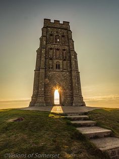 an old tower with stairs leading up to it