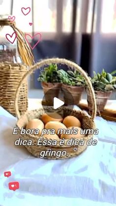 a basket filled with eggs sitting on top of a table