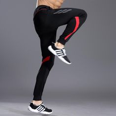 Elevate your workout wardrobe with our high-quality gym fitness clothing. Designed to provide maximum comfort and style, our collection will keep you looking and feeling your best during any workout. Made with breathable materials, our fashionable pieces are perfect for even the sweatiest of sessions. Upgrade your gym wardrobe today! Casual Black Running Sweatpants, Red Stretch Sweatpants For Jogging, Athleisure Red Sweatpants For Gym, Functional Black Sweatpants For Running, Red Athleisure Sweatpants For Gym, High Stretch Breathable Black Pants, Red Stretch Sweatpants Sportswear, Red Stretch Sweatpants, Black Fitted Full-length Joggers