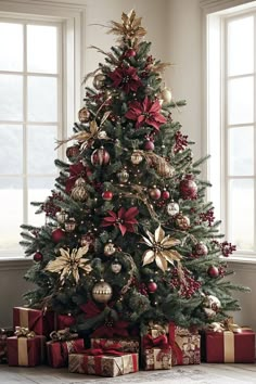 a decorated christmas tree with presents under it