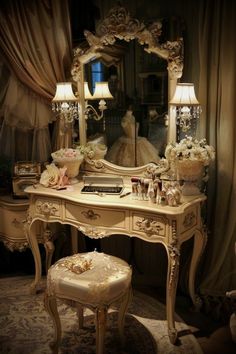 a dressing table with a mirror, stool and lamp