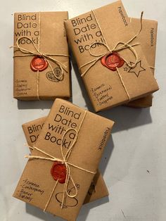 three brown packages tied up with twine