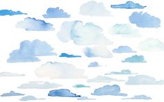 blue and white watercolor clouds in the sky