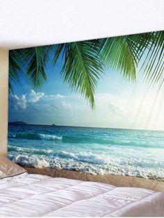 an ocean scene with palm trees on the beach wallpaper mural in a hotel room