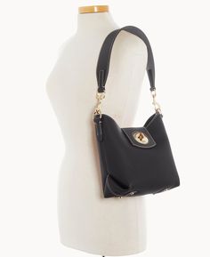 Casual Cool This gorgeous new look features classic Italian pebble leather and a jewelry grade turnlock closure, for a one of a kind look. One inside zip pocket. Two inside slip pockets. Inside key hook. Removable strap. Lined. Feet. Turnlock closure. | Dooney & Bourke Women's Pebble Turnlock Sac 22 Leather Shoulder Bag in Black Elegant Pebbled Leather Shoulder Bag With Metal Hardware, Elegant Top Handle Shoulder Bag With Snap Closure, Pebbled Leather Shoulder Bag With Metal Hardware For Everyday, Elegant Shoulder Bag With Snap Closure For Everyday Use, Elegant Everyday Shoulder Bag With Snap Closure, Elegant Pebbled Leather Bag With Turn-lock Closure, Key Hook, Satchel Tote, Wristlet Clutch