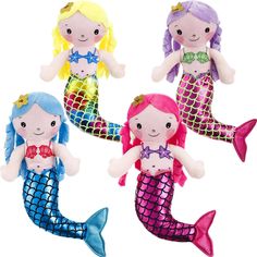 three little mermaid dolls sitting next to each other