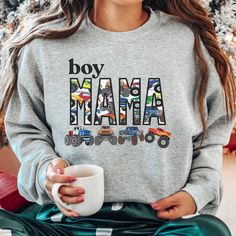 This Cozy Boy Mama Matching Sweatshirt and t-shirt with Big Monster Trucks Theme  is sure to be a favorite gift for mom and son.  Perfect for boy baby shower gifts or new mom boy gifts, boys birthday or mom's birthday. These Matching Mother and Son Mama's Boy shirts are too cute and can be paired with Boy Mama Sweatshirt.  Also Tees and Baby Bodysuits.  MATCHING COMFORT COLORS SHORT AND LONG SLEEVES: https://www.etsy.com/listing/1496514221 FOR MATCHING COMFORT COLORS SWEATSHIRTS: https://www.ets Graphic Print Sweatshirt For Birthday And Mother's Day, Casual Sweatshirt For Birthday And Mother's Day, Mother's Day Birthday Graphic Print Sweatshirt, Mother's Day Birthday Crew Neck Sweatshirt, Monster Truck Jam, Big Monster Trucks, Boy Mom Shirt, Monster Truck Theme, Big Monster