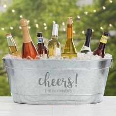 a bucket filled with lots of bottles of wine