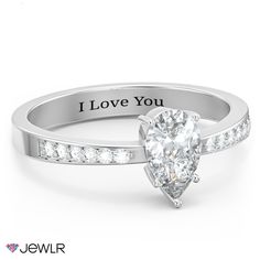 a diamond engagement ring with i love you written on the side and diamonds around it