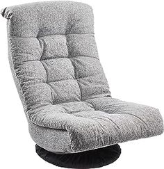 a grey reclining chair sitting on top of a black base